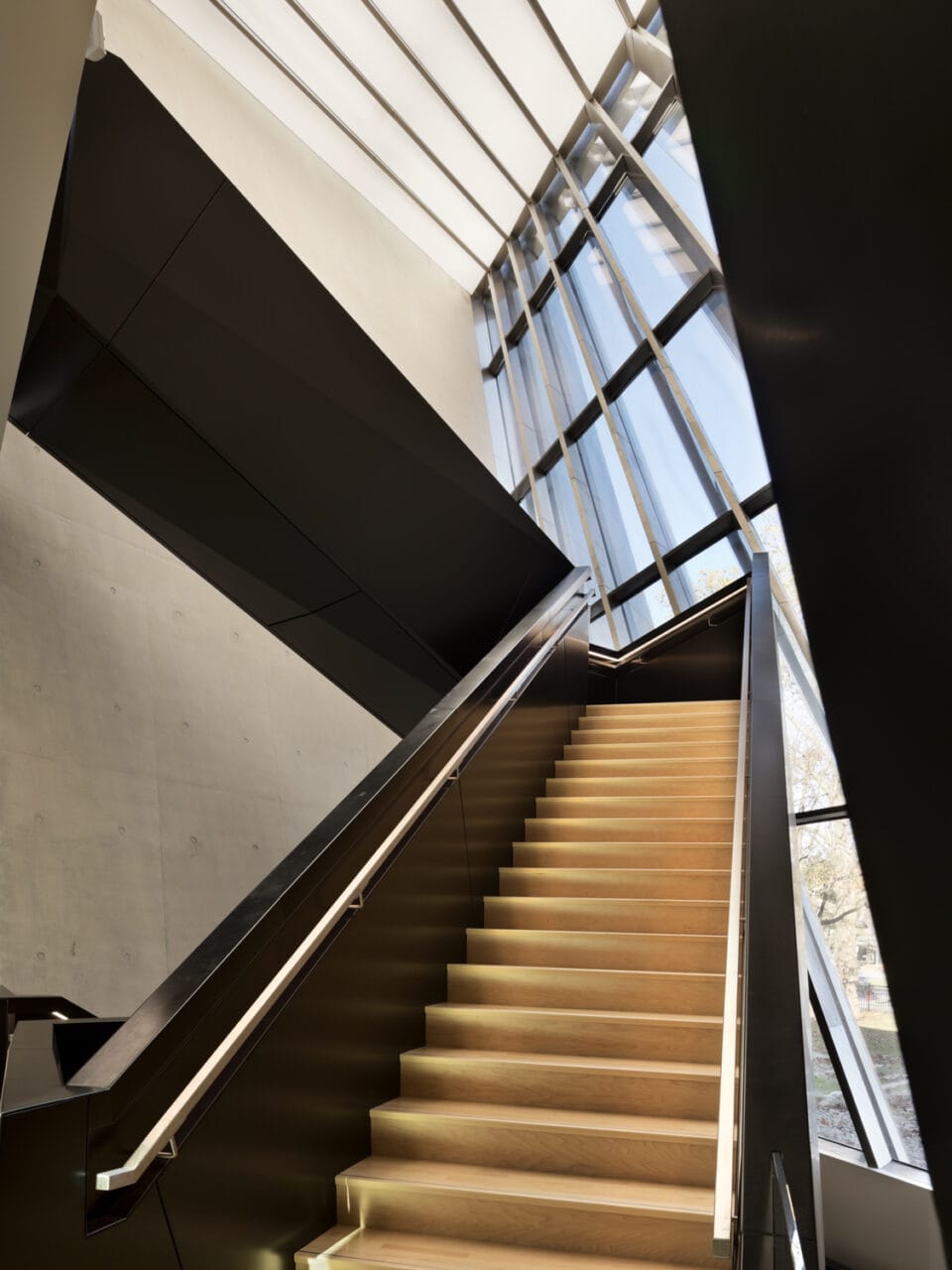 Image of stairwell at Broad Art Museum in Lansing, Michigan. Zaha Hadid Architects, architectural wall system by Riverside Group. Photo by Paul Warchol.