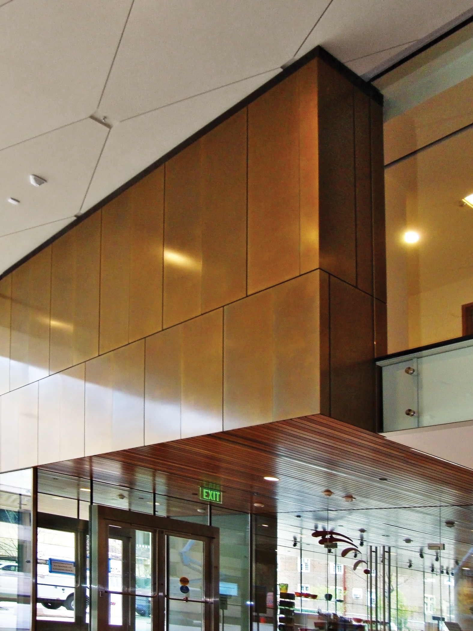 Image at Chazen Museum of Art shows patined bronze interior surface. Architectural system by Riverside Group.