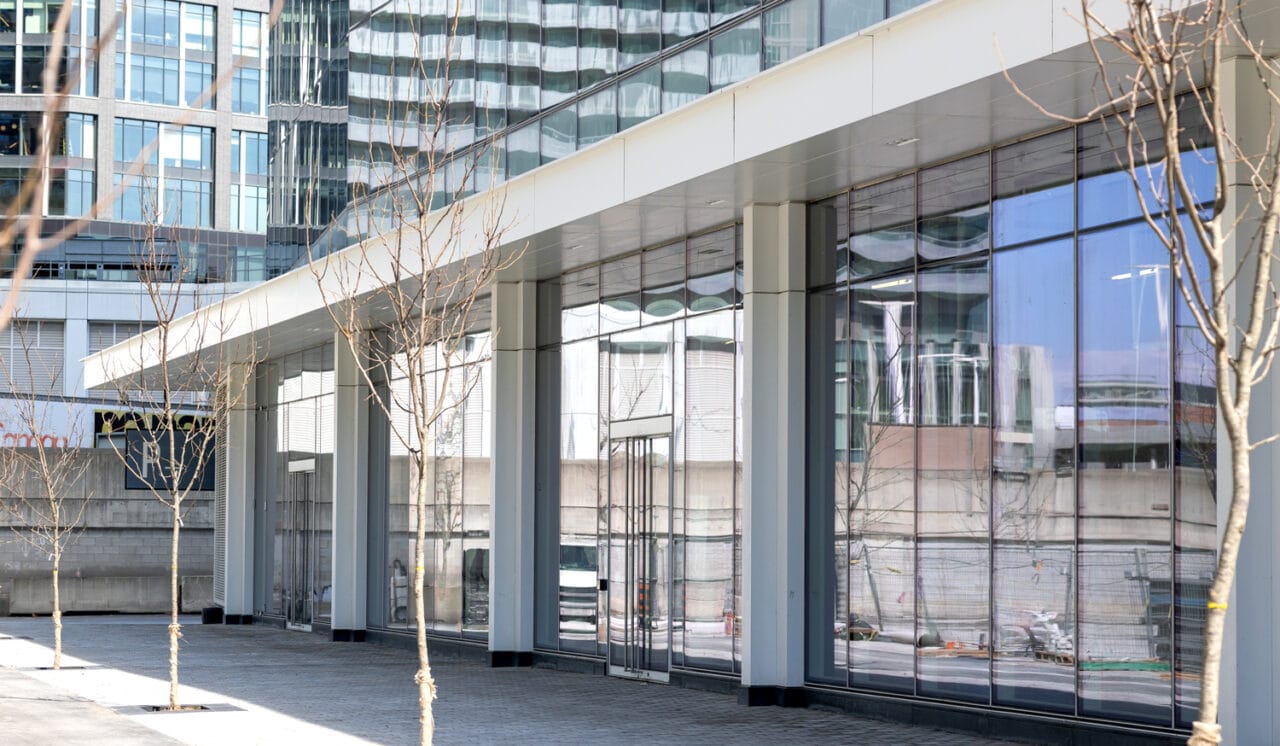Exterior image with columns at 100 Queens Quay, Toronto.